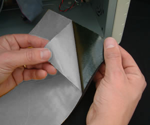 Peel off the adhesive backing paper